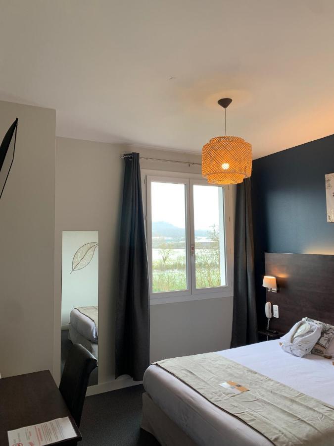 Logis Hotel Aux Berges De L'Aveyron Onet-le-Chateau ภายนอก รูปภาพ